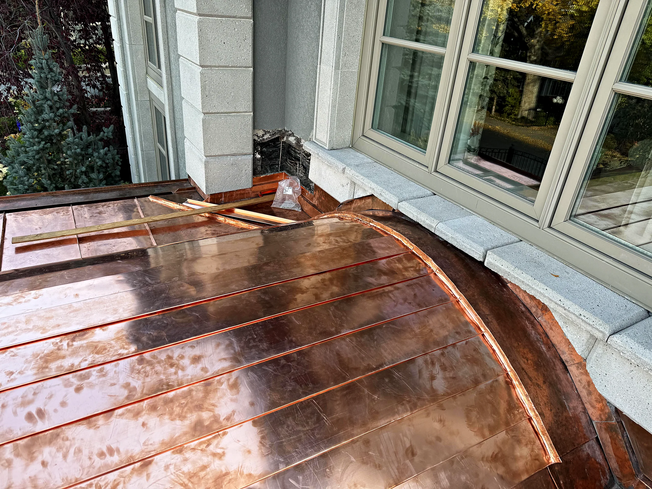 Curved copper bay roof