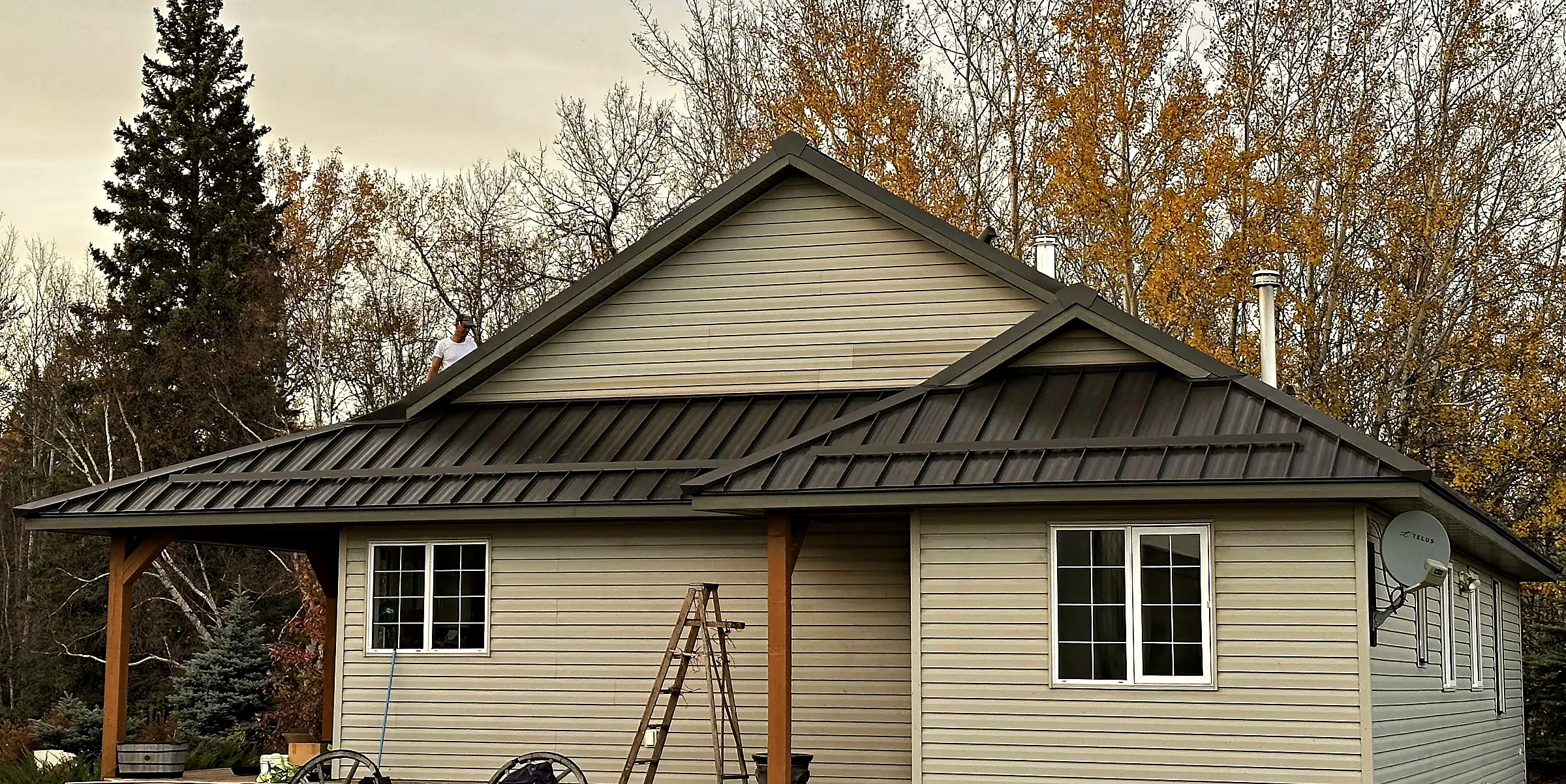 House with a new standing seam steel roof