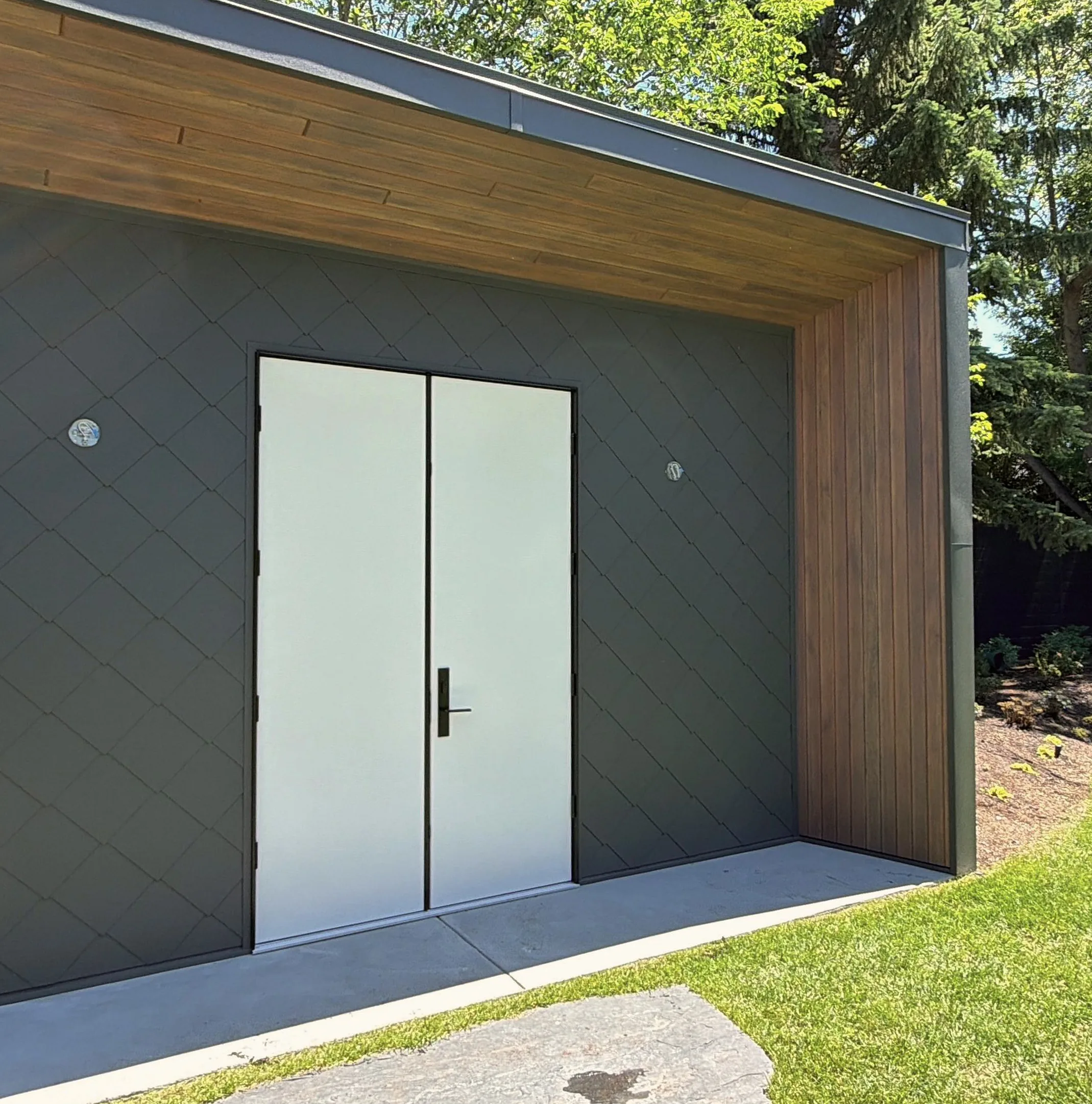 Garden shed clad in zinc