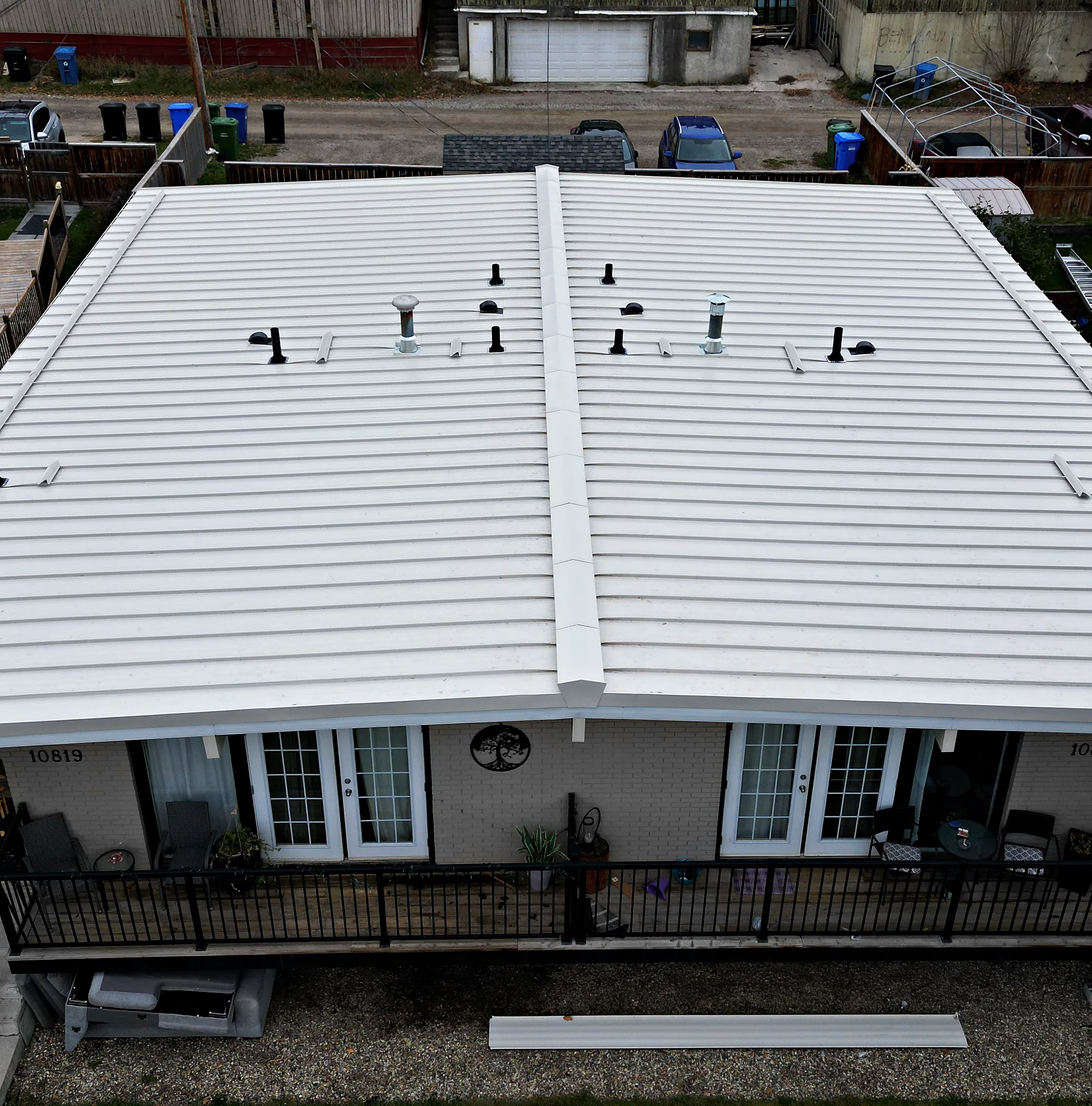 White standing seam roof on a house in south Calgary