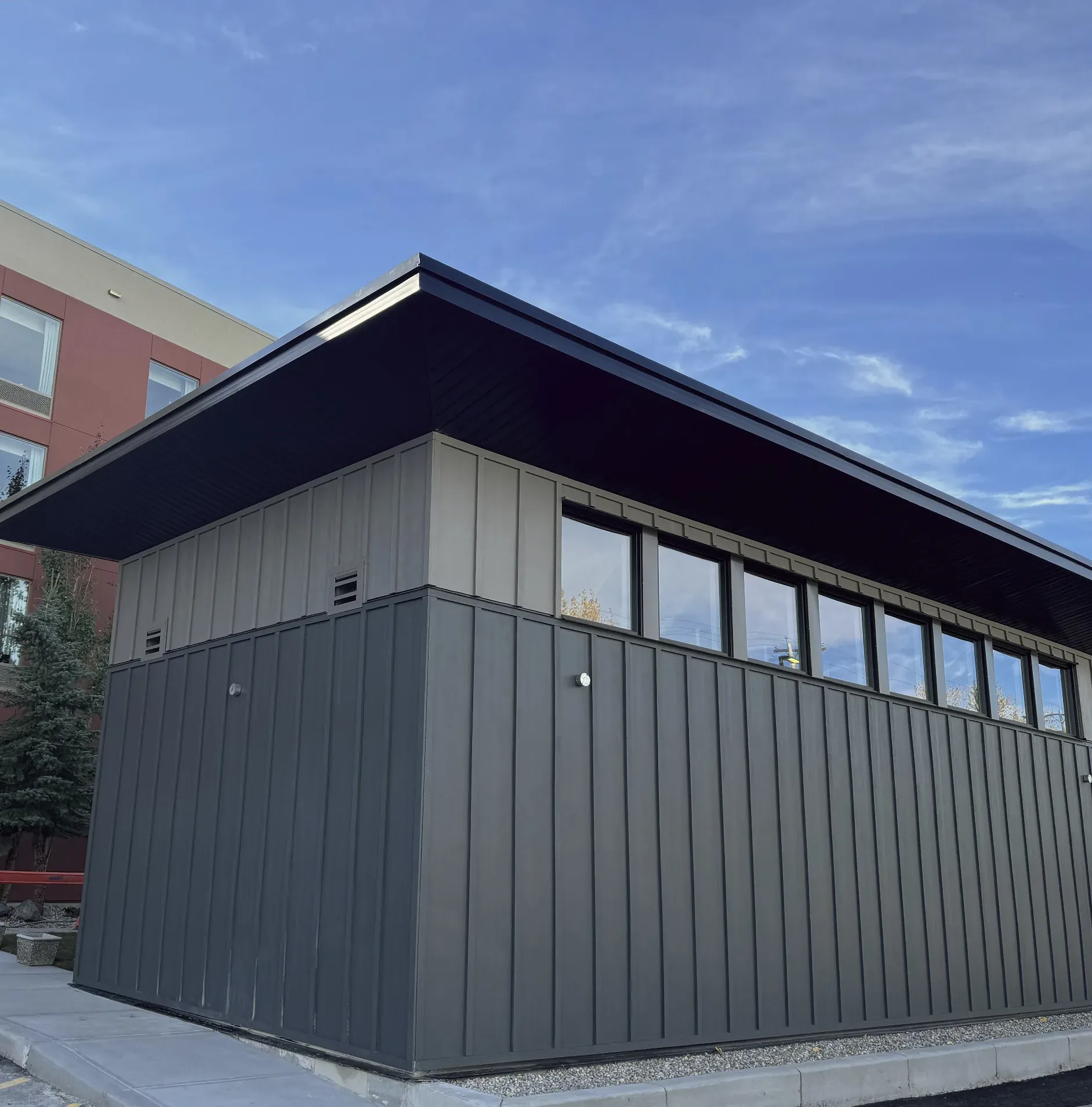 Vertical metal siding on an outbuilding