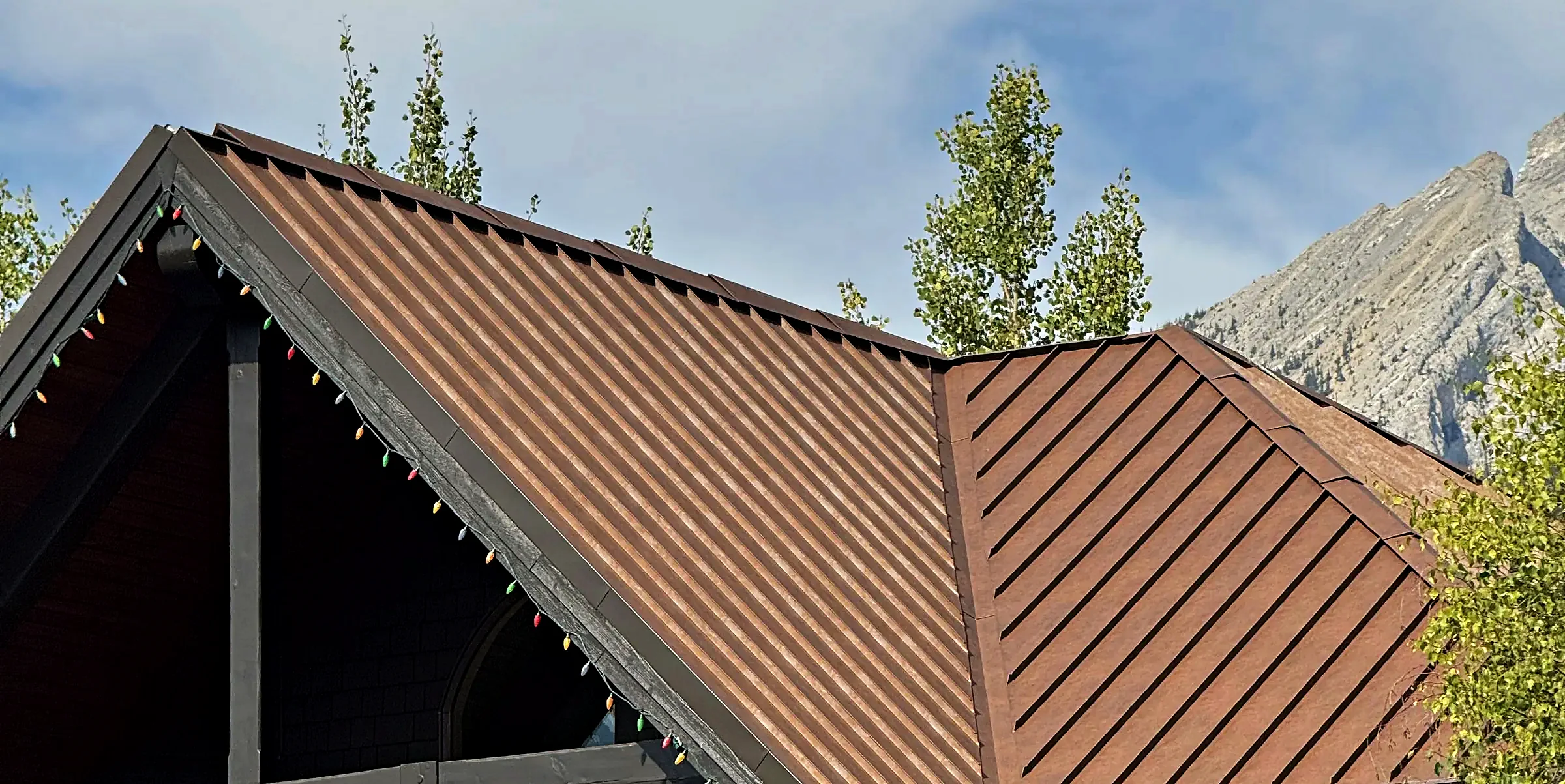 Standing seam roof under the mountains