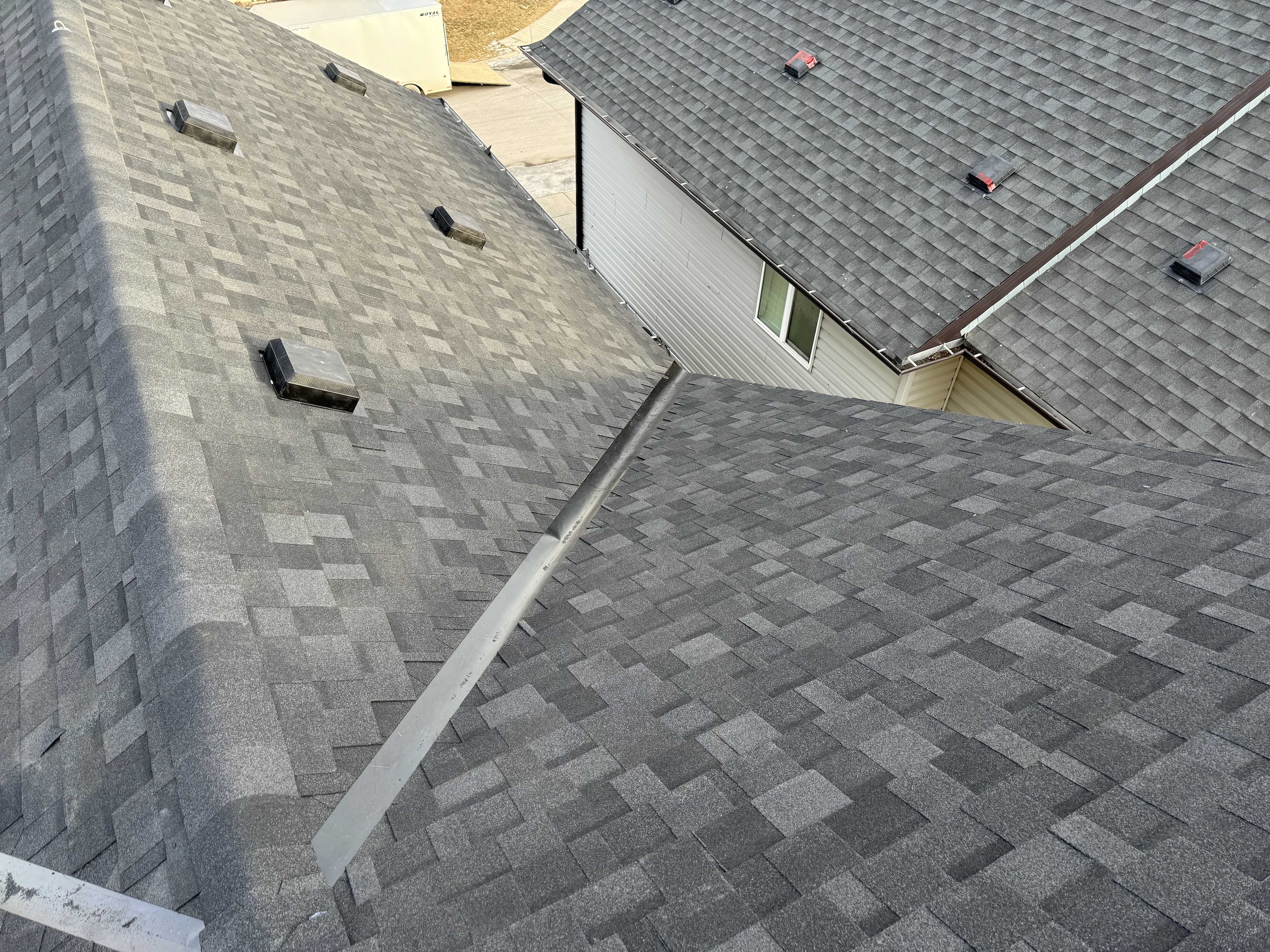how long does a shingle roof last